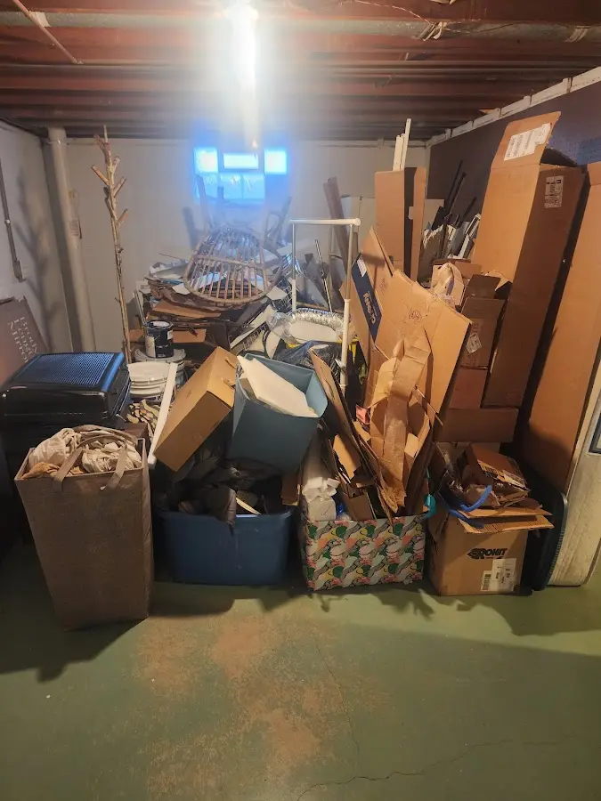 Roll-off dumpster container at job site for 15 Yard Dumpster Rental in Garfield